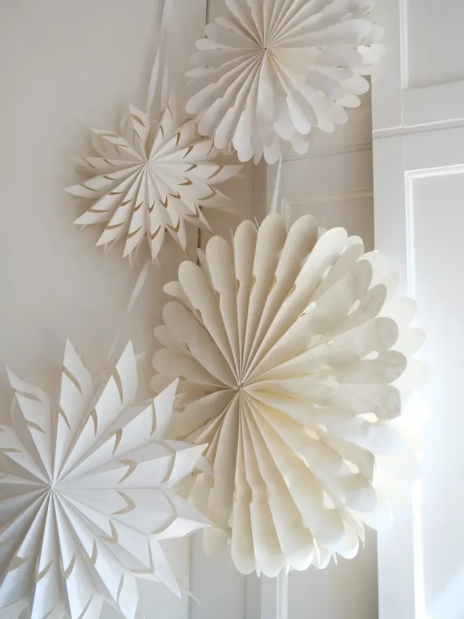 curved white star paper hanging decorations