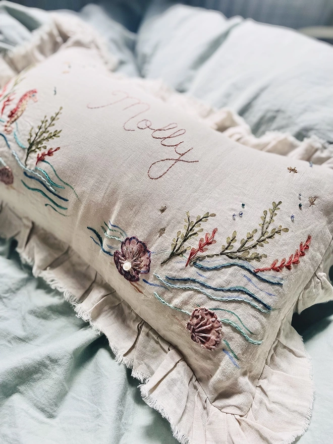Under the sea, hand embroidered cushion on natural linen with personalised name 