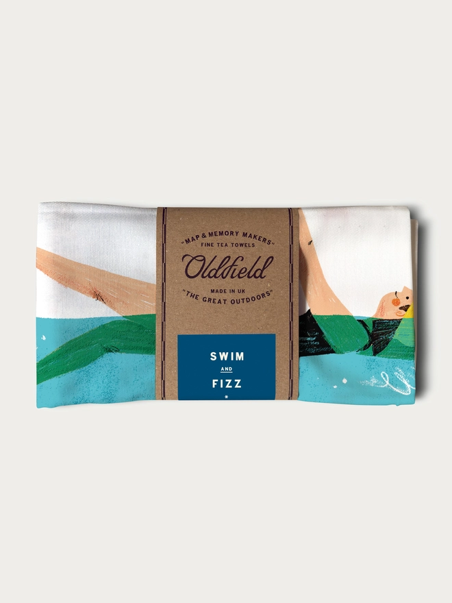 Swim and Fizz tea towel folded and packaged