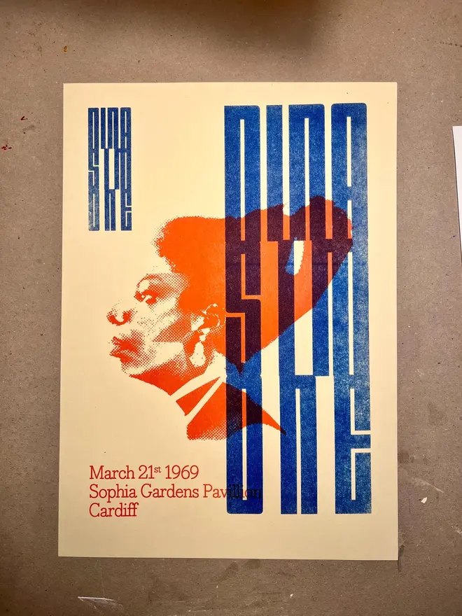 'Nina Simone' Handmade Risograph Gig Poster, against a grey wall. 
