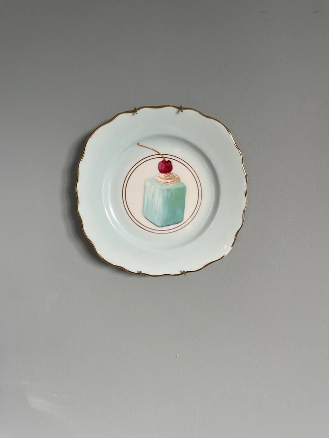 blue fondant painting on plate