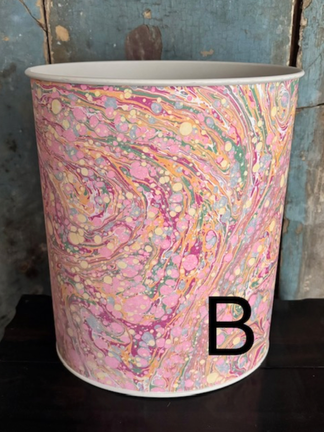 Oval Waste Paper Bin. A bin in B
