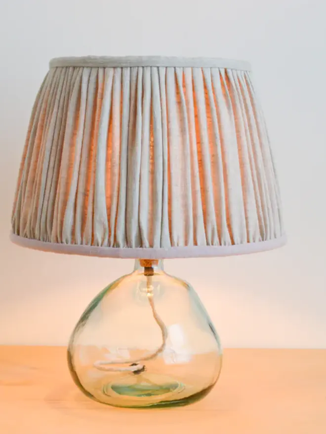 Natural Linen & Pink Gathered Lampshade lit up