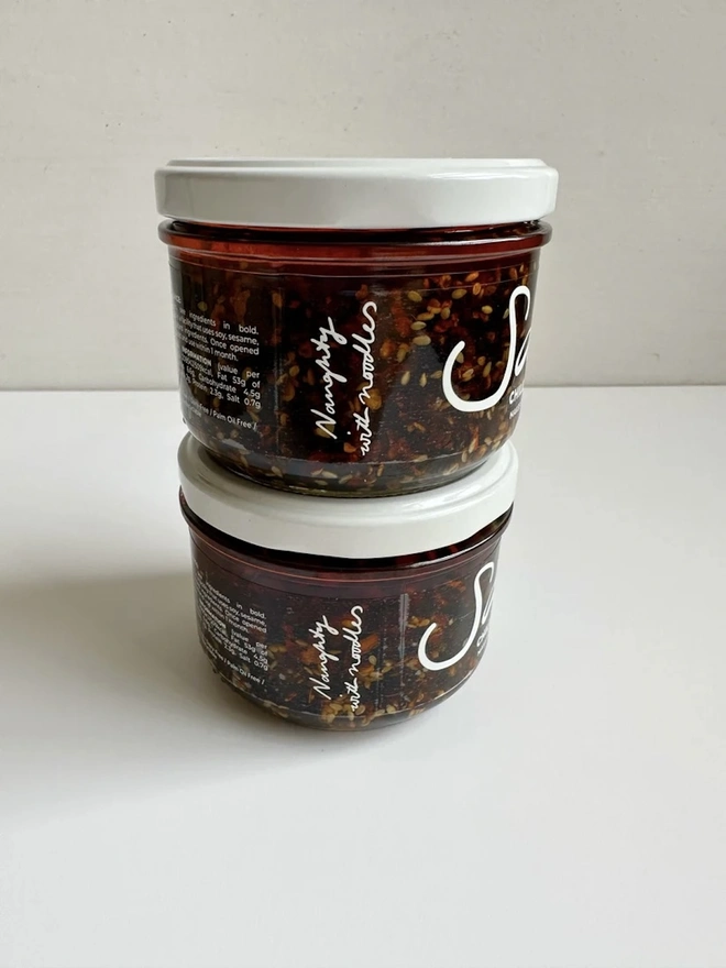 Chilli Sambal (Set Of 2), a pair of chilli sambals sitting on a white table against a grey backdrop