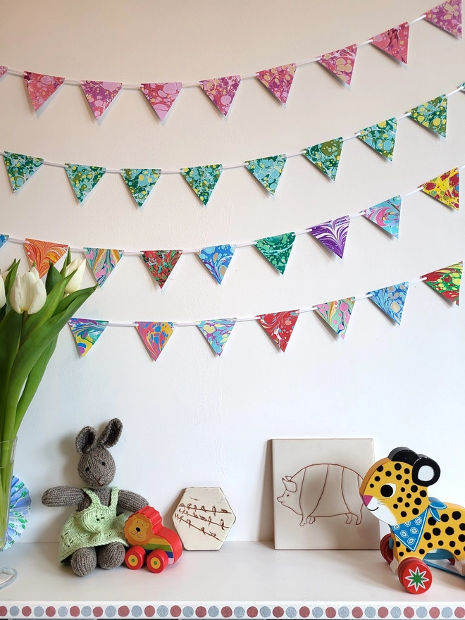 Hand-marbled multi-coloured rainbow paper bunting