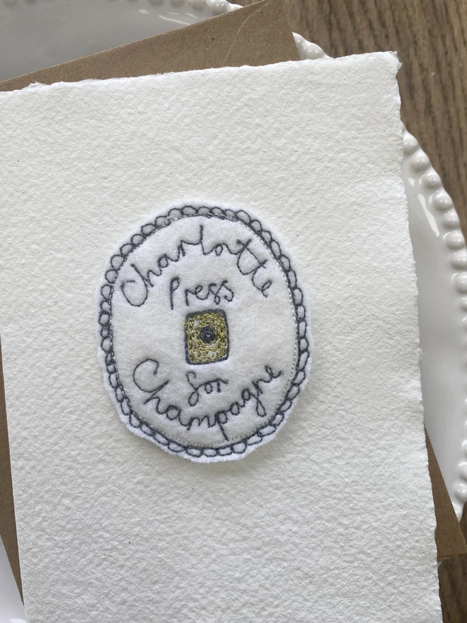 champagne bell card personalised on plate