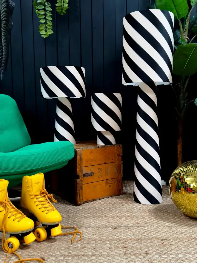 Portable Helter Skelter Velvet Lamps, in a room. 