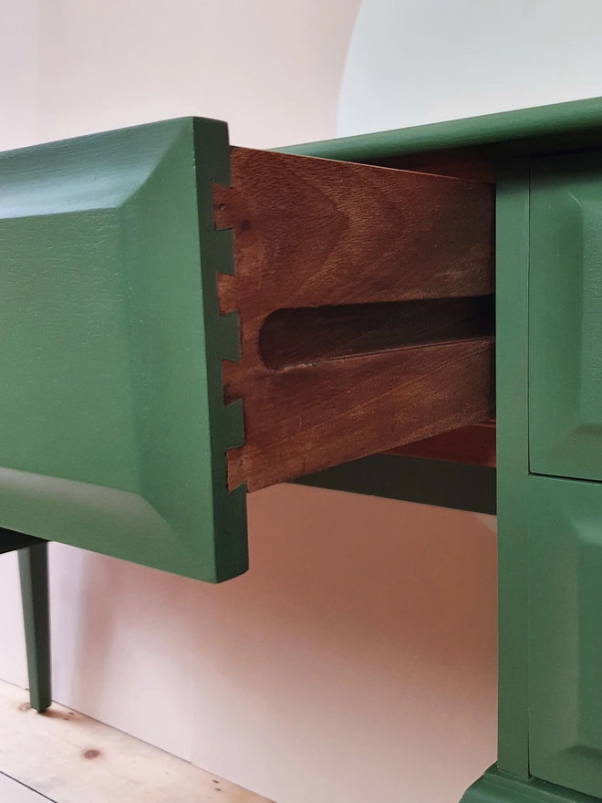 Drawers with dovetail joints painted green desk