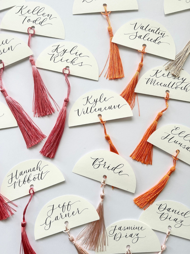 arch wedding place cards tassels