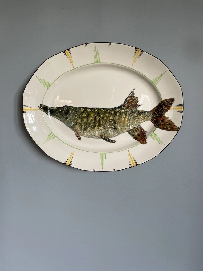 original oil painting of a pike fish on art deco plate