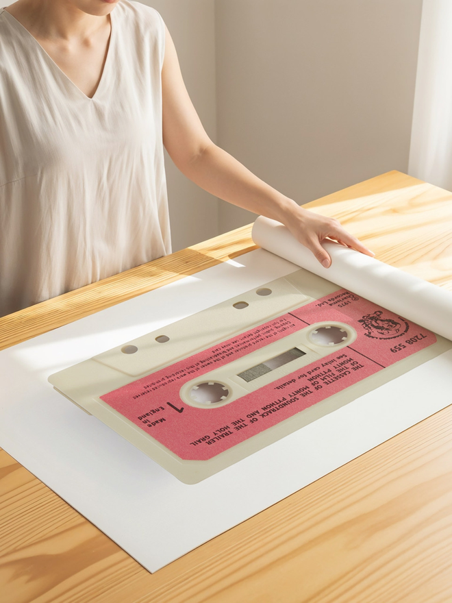 Monty Python Soundtrack Print. A large print in the shape of a cassette of the Monty Python soundtrack
