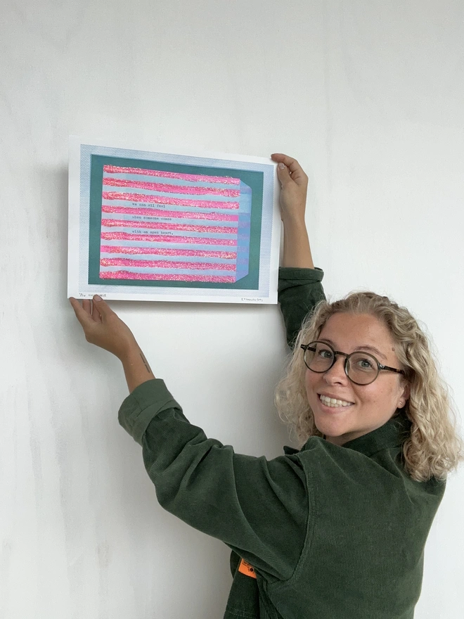 Emily holding Sweet Nothing print 