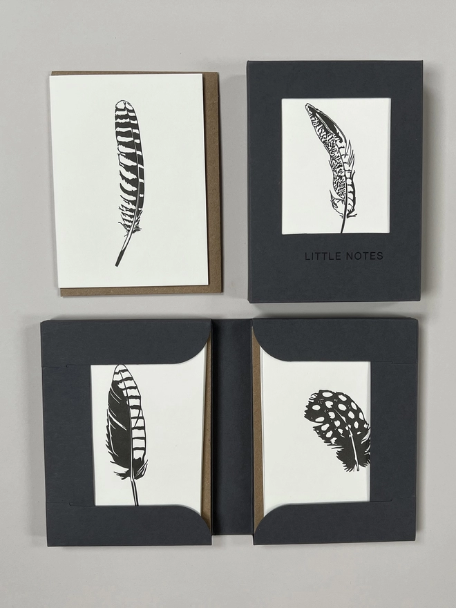 Open and closed feather gift boxes for little notes allowing you to see three of the four designs in one box