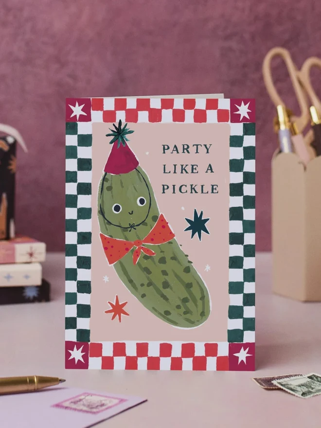 Party Like A Pickle Card standing on a desk