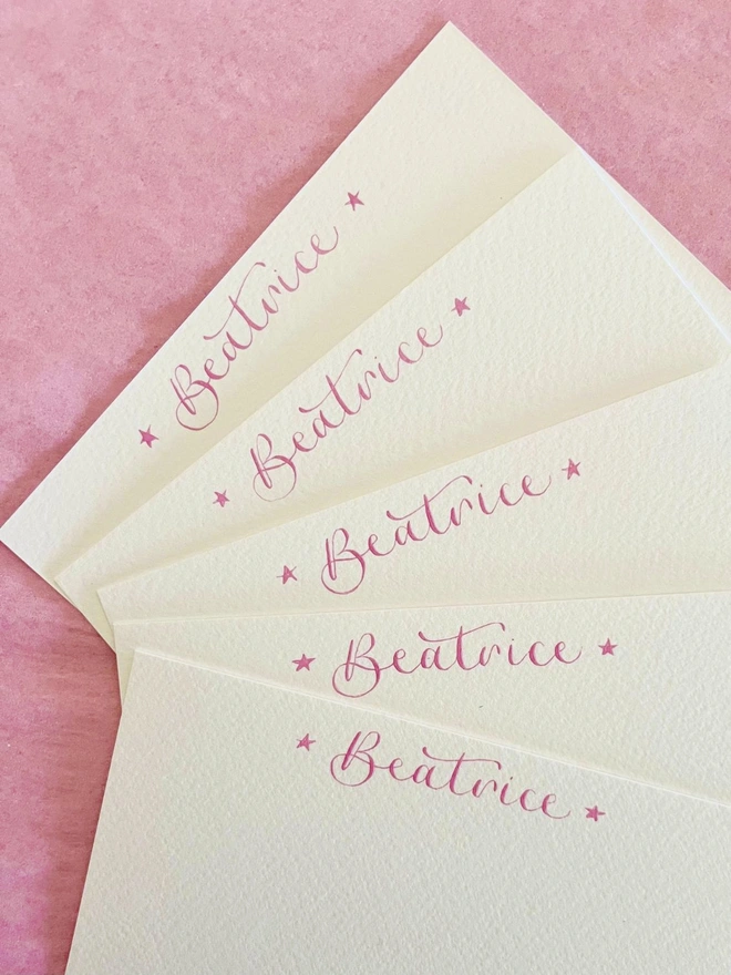 Personalised notecards with Beatrice in light pink with stars either end