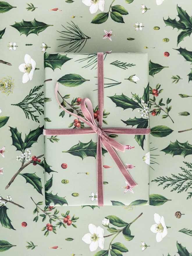 Green based Christmas wrap with festive elements pattern
