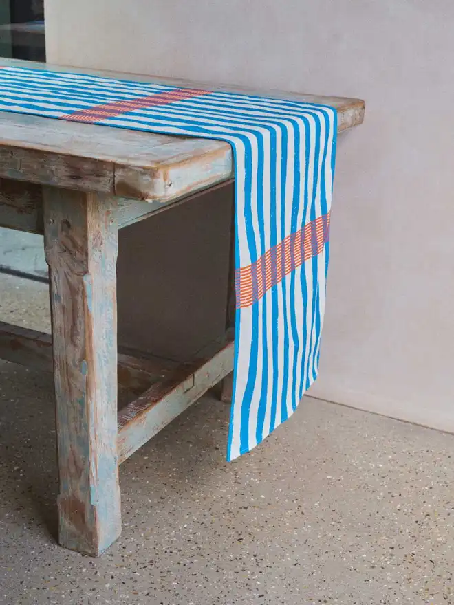 Blue and orange stripe table runner