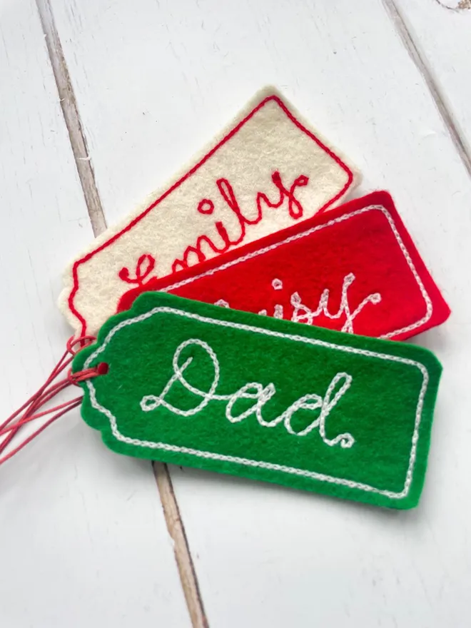 christmas embroidered gift tag in red, green and cream