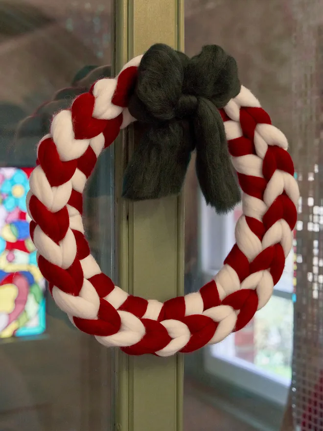 Knitted Christmas wool candy cane wreath