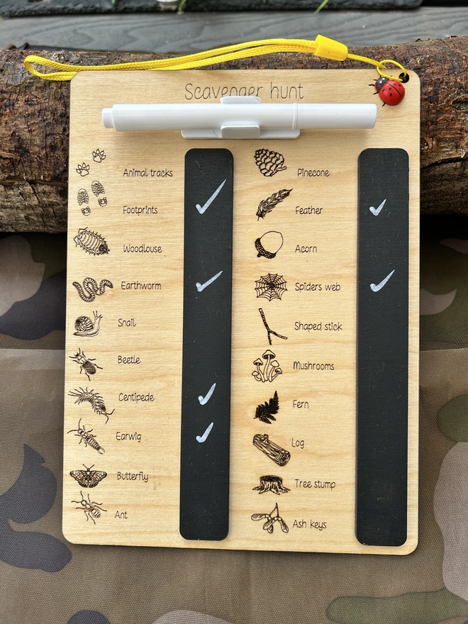 Scavenger hunt wipe-clean board with white chalk pen and sponge for cleaning