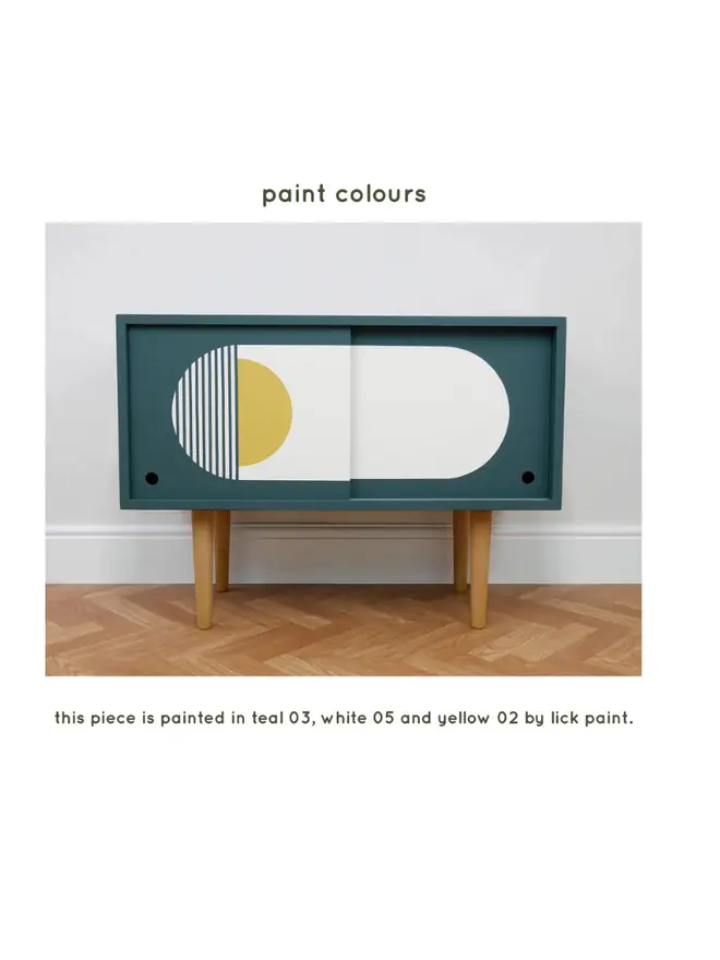Teal mid-century record cupboard with sliding doors featuring bold geometric patterns in white and yellow.