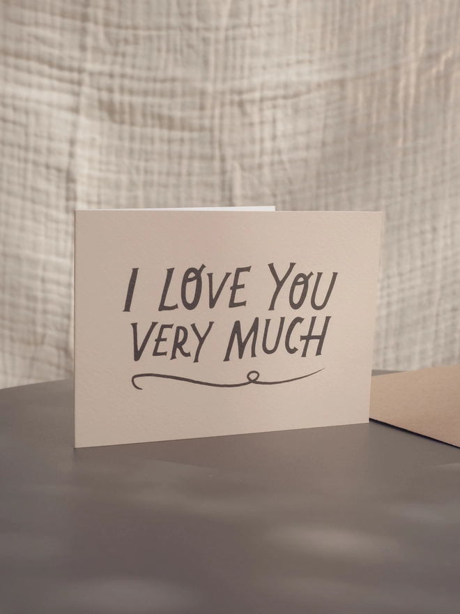 'I love you very much' romantic valentine's day card. a white card with 'i love you very much' in black letters on the front.