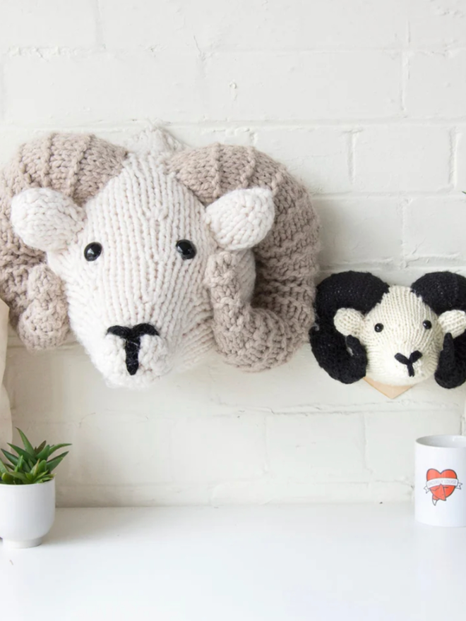 Ram Head Knit Kit. A large ram head next to a mini.