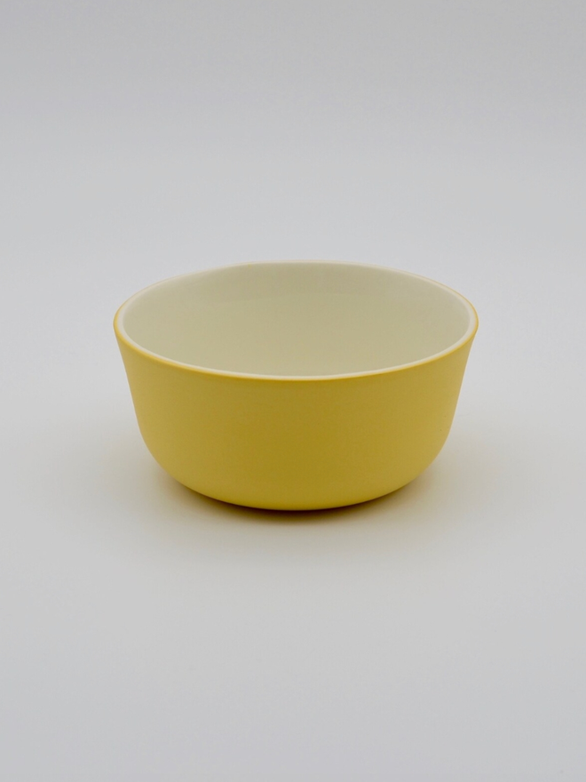 Snack Bowl. A yellow snack bowl.