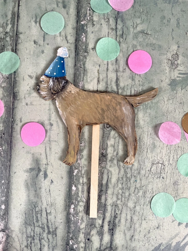 Border Terrier Hand Painted Wooden Cake Topper with a blue hat