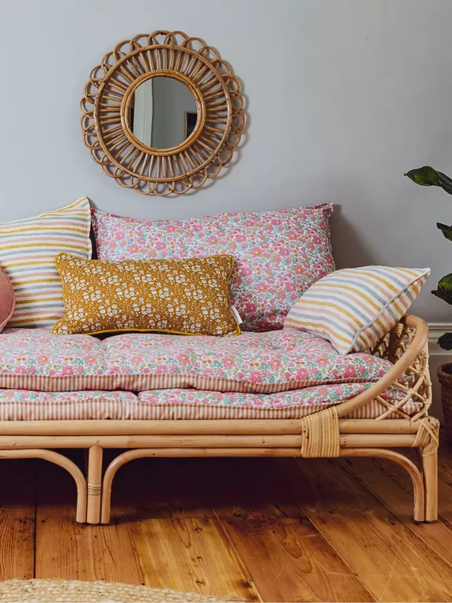 Lumbar cushion in 'Seaside Stripe' cushion on a sofa