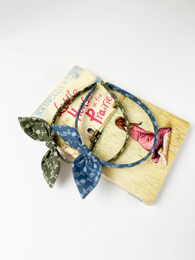 Two liberty hair band on book