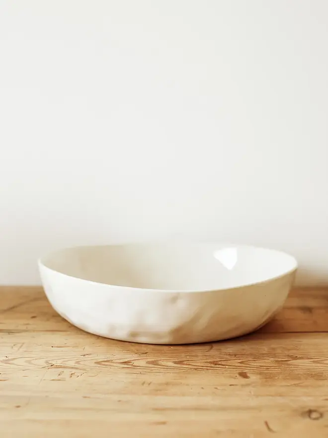 'milk' handcrafted stoneware bowl. a large white serving bowl.