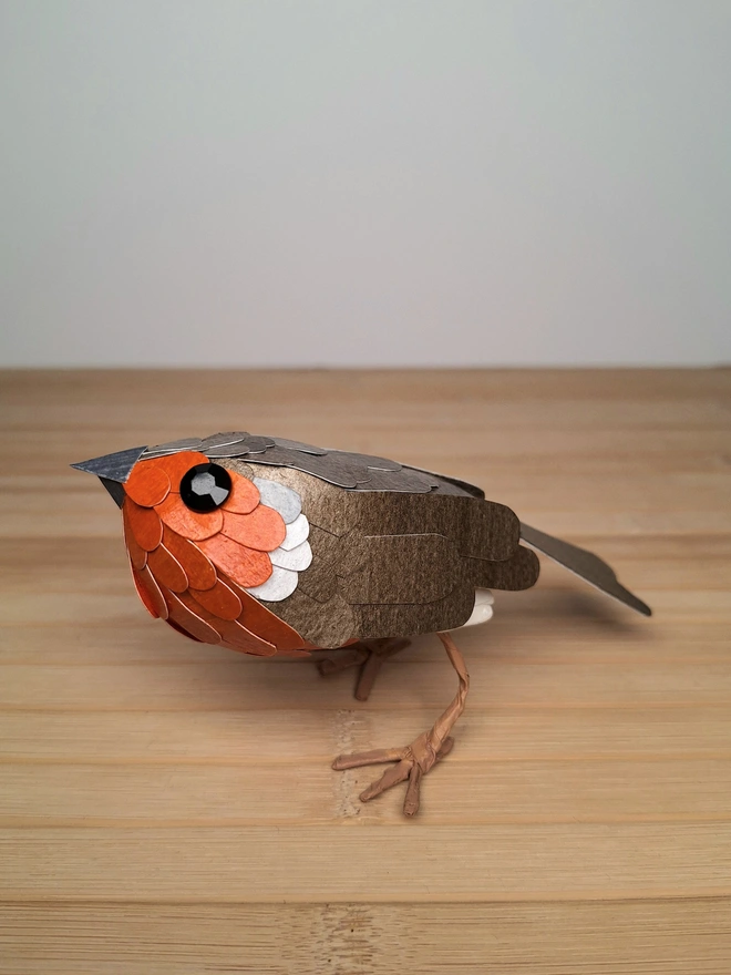paper sculpture of a robin, side view