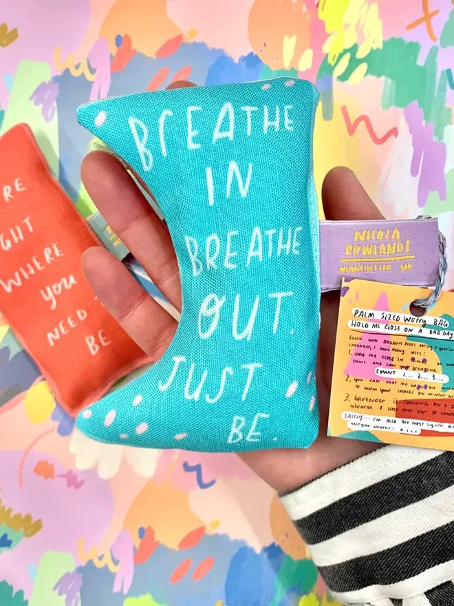 Sensory bag reads 'breathe in. breathe out. just be.' 