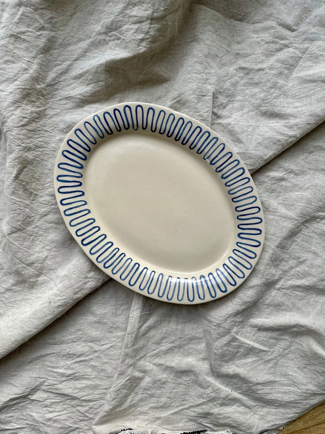 A platter with a decorated rim