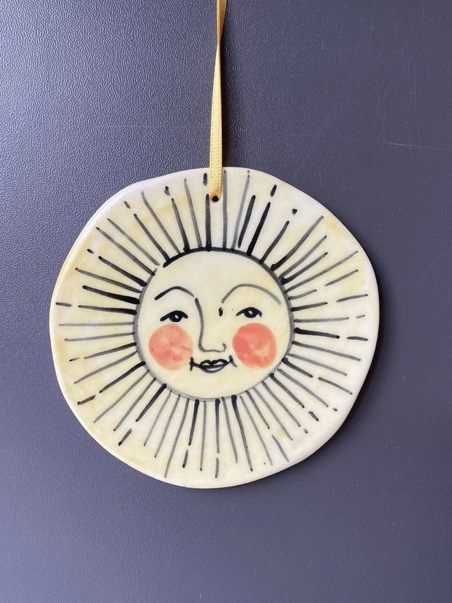 Hand-Painted Porcelain Sun Hanging Decoration