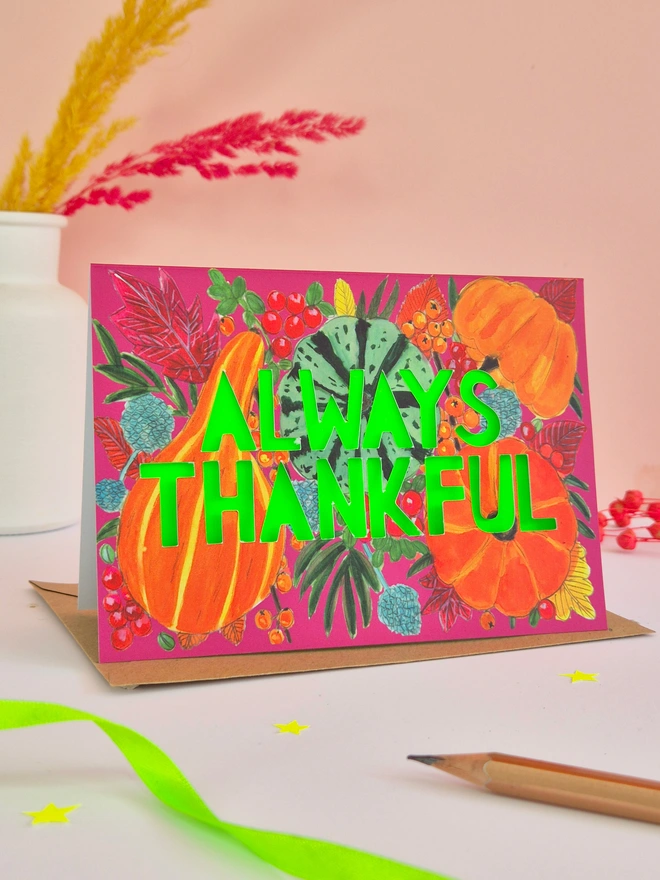 Pumpkin Thanksgiving card with Always Thankful paper cut text and neon green backing paper 