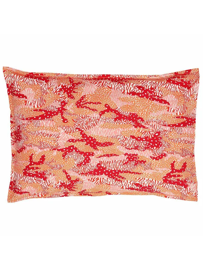 Orange Big Cat Camo Duvet Cover And Pillowcase, a red pillow sitting on a white surface. 