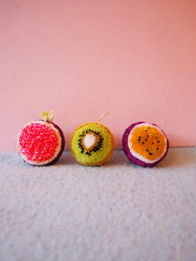 Trio of fruit pom poms
