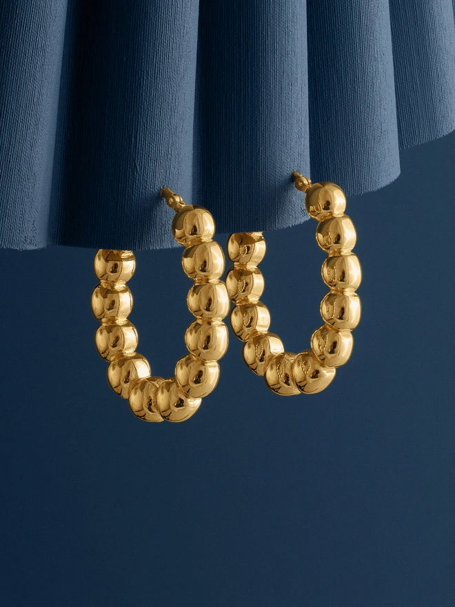 Loel Gold Beaded Oval Hoop Earrings