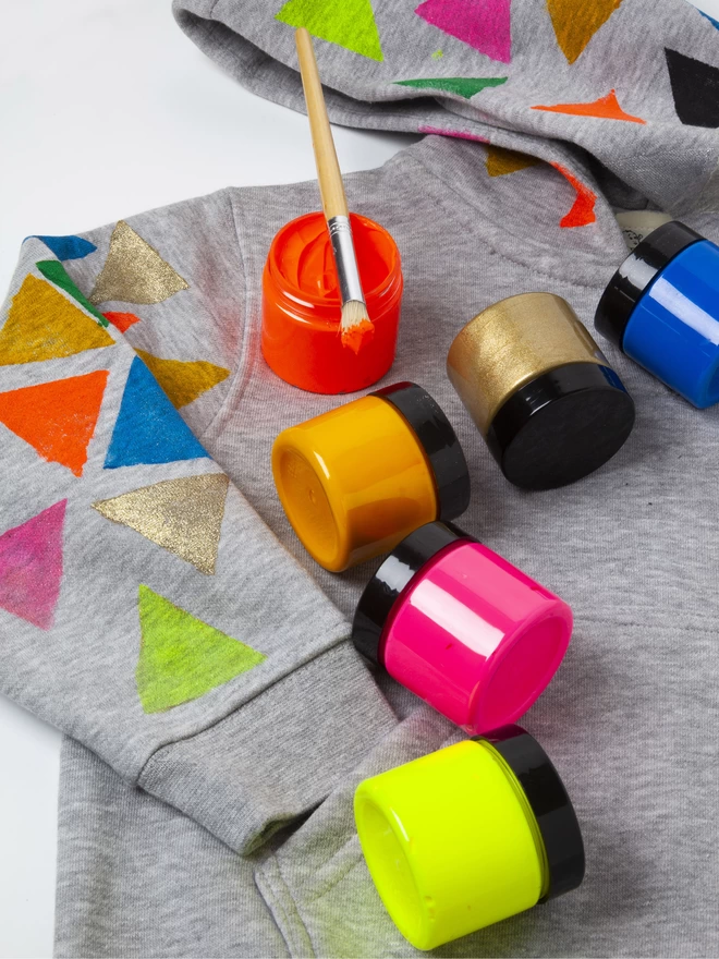 Coloured stamped triangles on sweatshirt