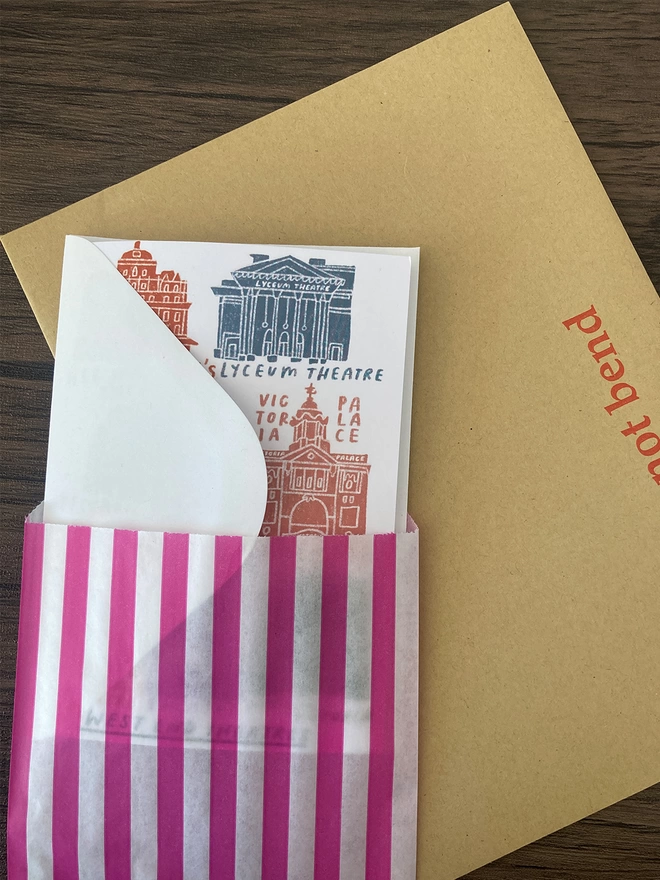 West End theatre card packed with an envelope inside a paper bag