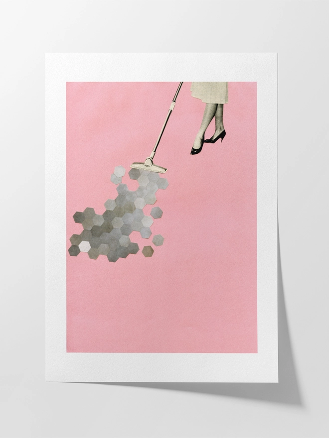 A retro print featuring a woman hoovering up geometric shapes.