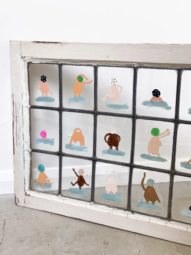 18 whimsical swimmers painted on old window stretching in the nude. Funny, quirky and playful