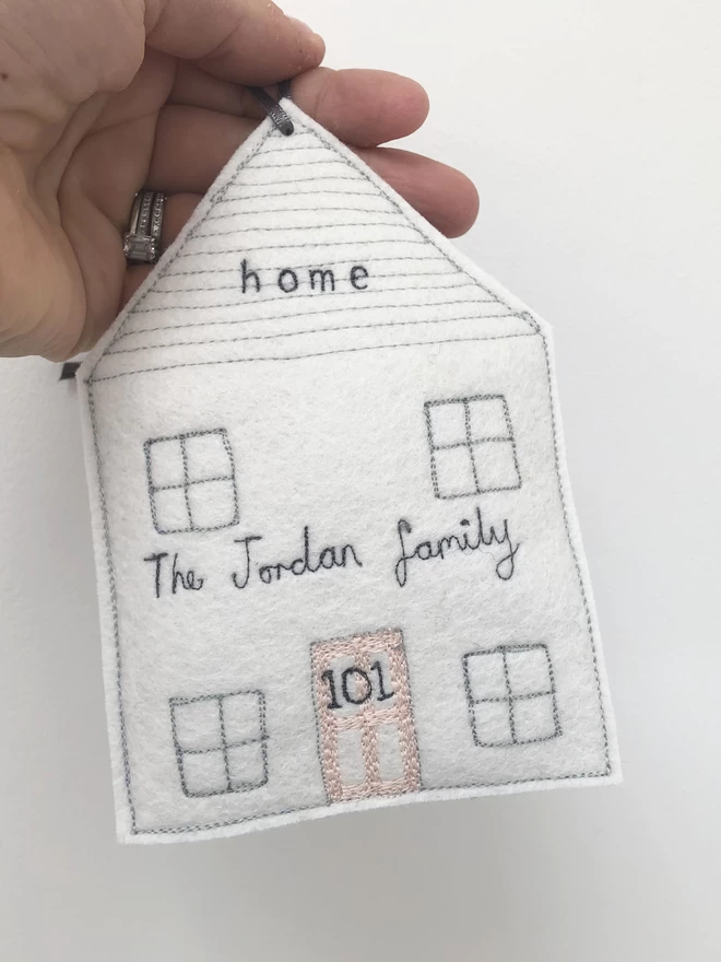 Home Personalised Embroidered Felt Decoration being held