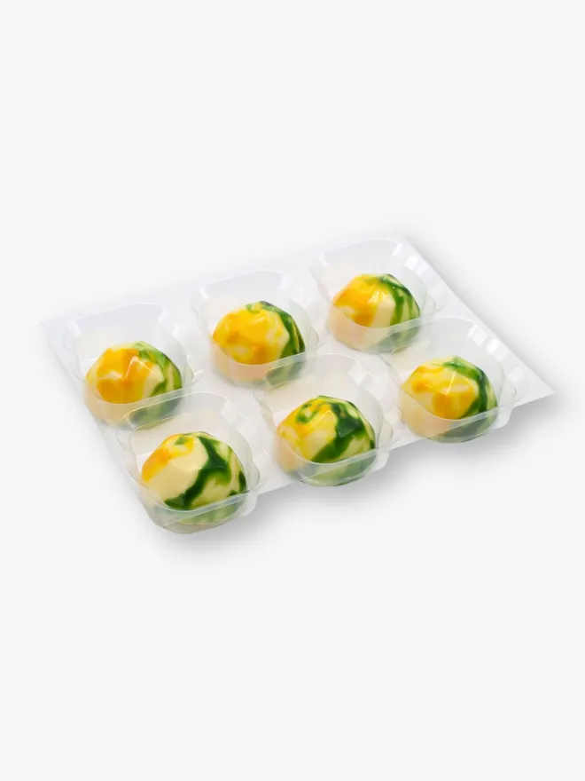 A tray of 6 luxury lemon and elderflower white chocolates
