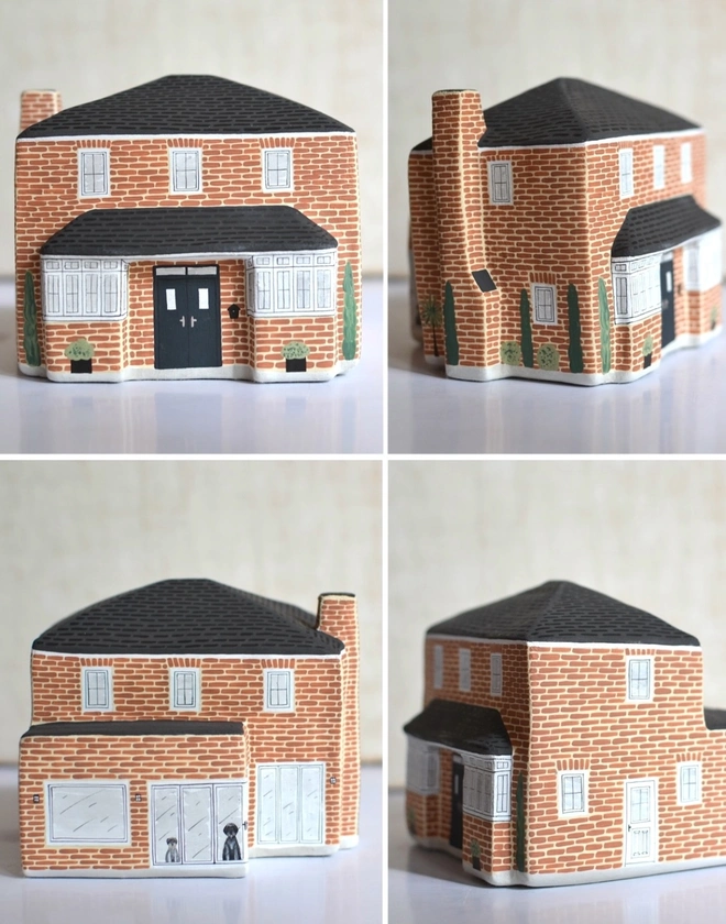 handmade ceramic sculpture in personalised design of a house
