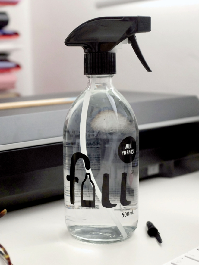 All Purpose. A spray bottle labelled Fill All Purpose on a desk.