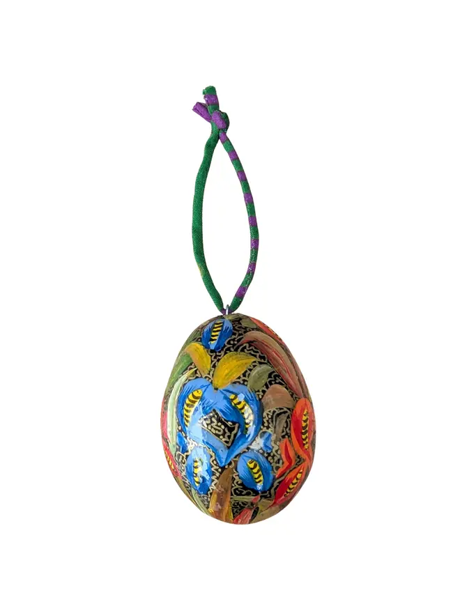 Handpainted egg with sari string