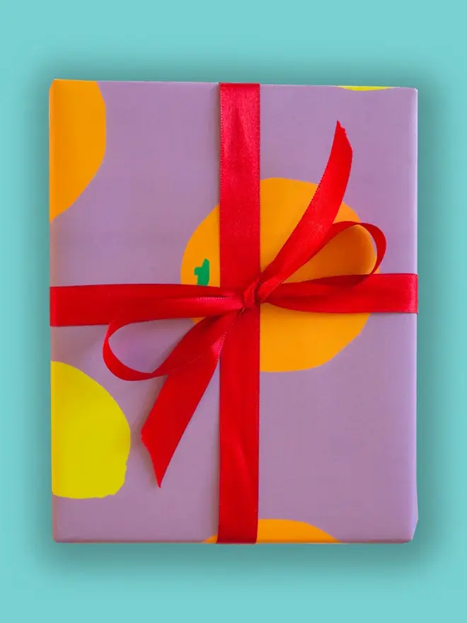 Oranges And Lemons Wrapping Paper, on a blue background. 